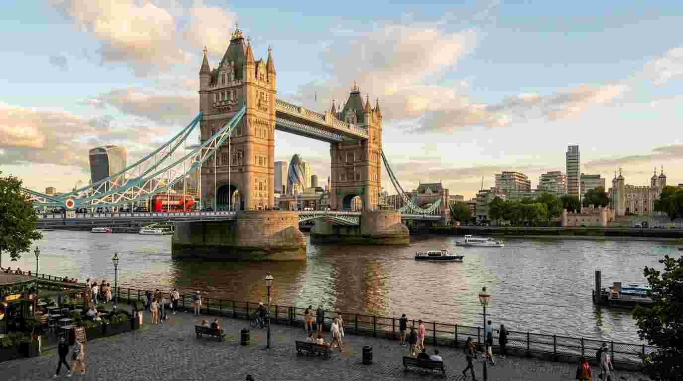 Tower Bridge spanning the River Thames with the London skyline in the background.