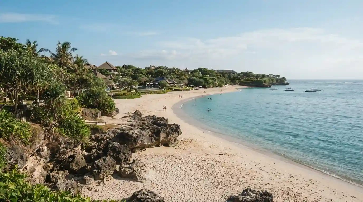 Tropical Nusa Dua coastline with sandy beach, turquoise water, and lush Bali scenery