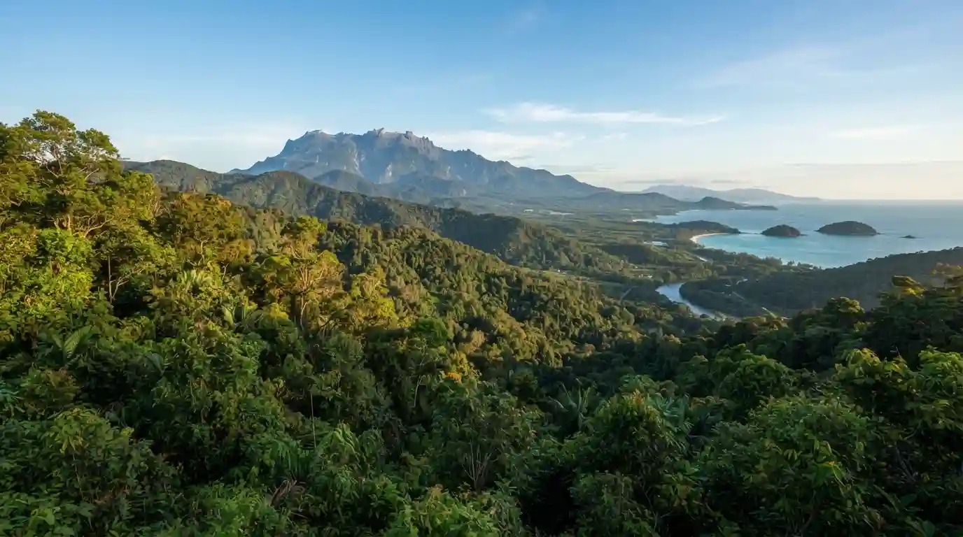 Mount Kinabalu surrounded by lush tropical landscape in Sabah, Malaysia